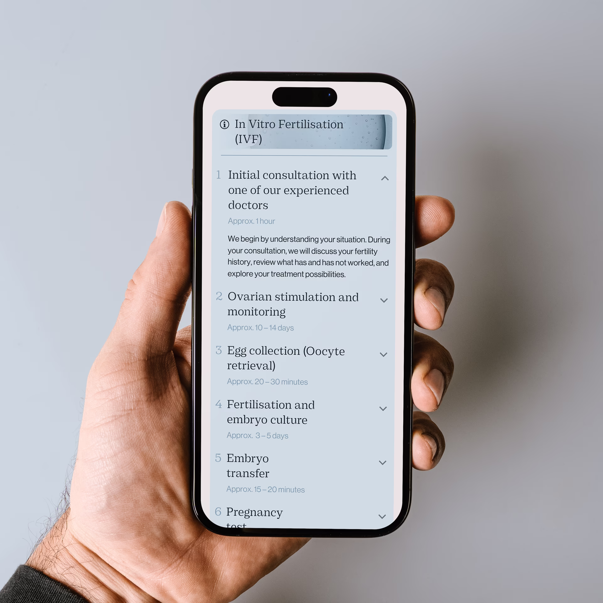 Genesis Athens website on a smartphone showing a male patient profile section